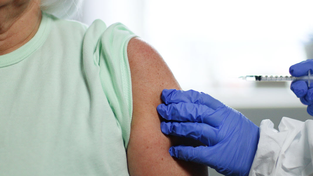 Provider administering flu shot